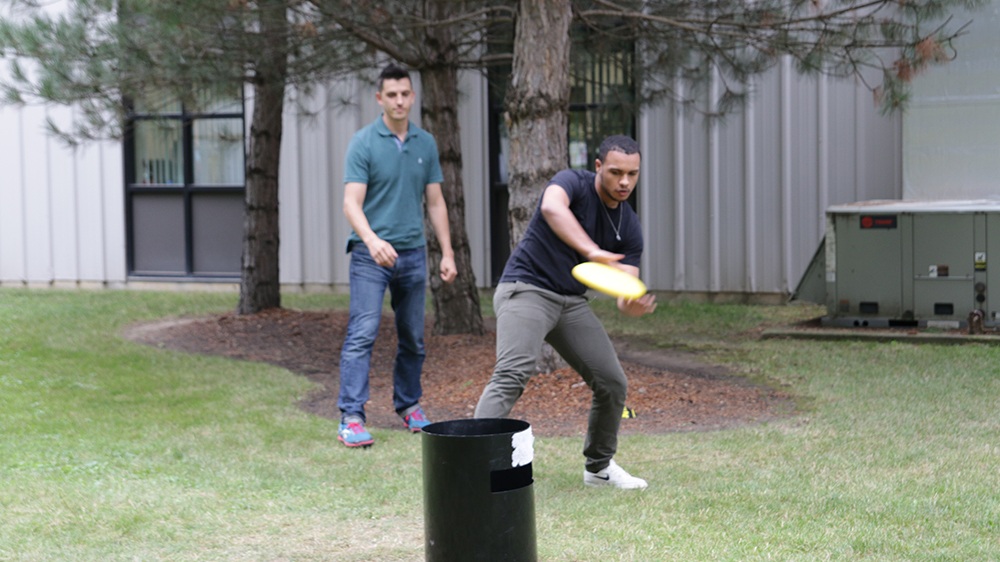 Employees Playing Kan-Jam at Summer Olympics